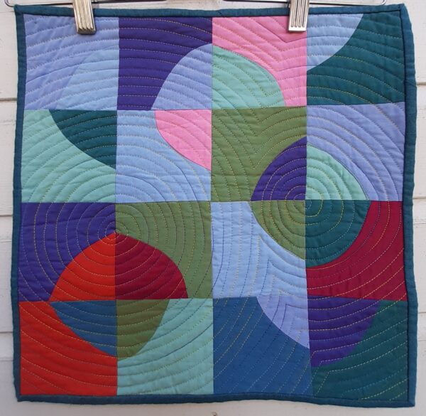 Improv circles in blues, purples and red