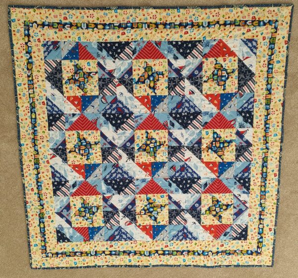 Colourful quilt using Friendship Star blocks